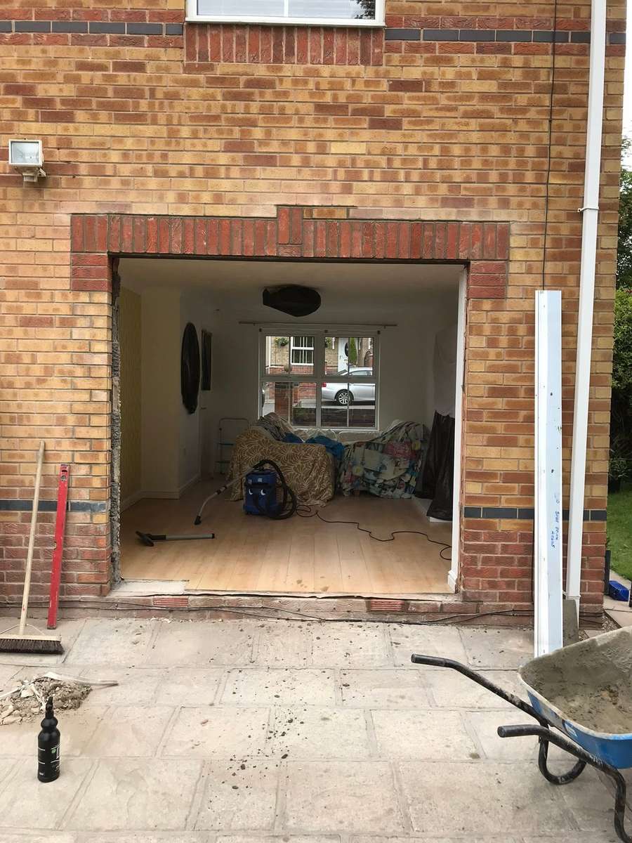 A knocked through opening held on an acrow prop